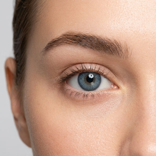 Orama Glam Blue colored contact lens shown on a single eye