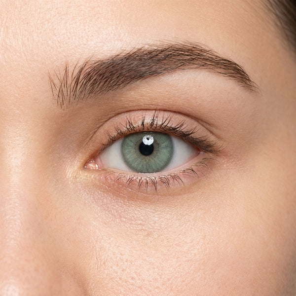 Orama Mint Dream colored contact lens shown on a single eye